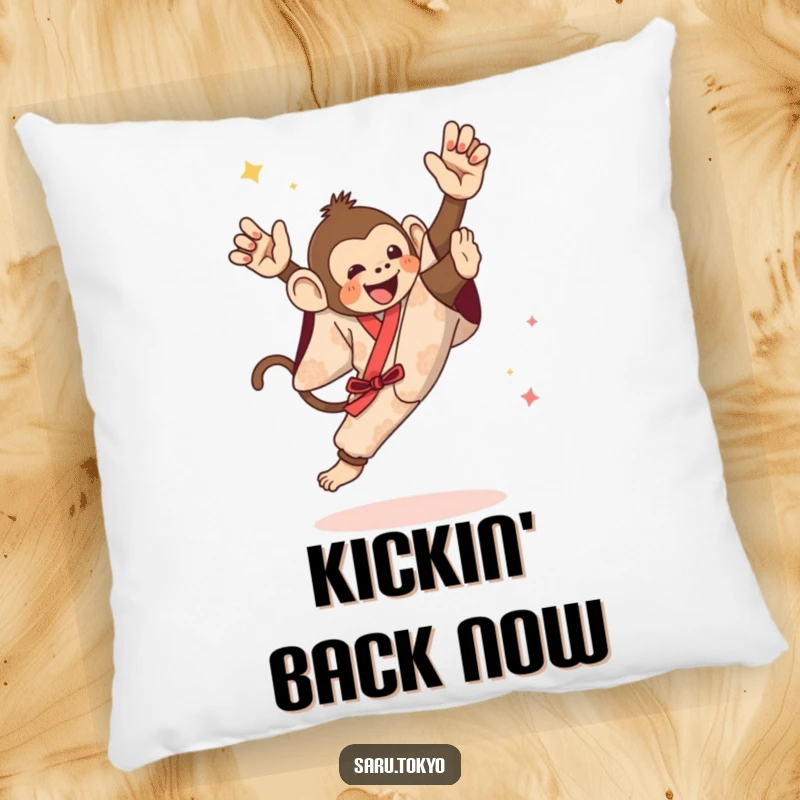 Funny pillow featuring a monkey in a festive kimono attempting a powerful and athletic high kick with focus.