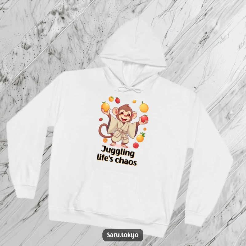 Funny hoodie with a monkey dressed in a silk kimono, gracefully juggling an array of colorful fruits with poise.