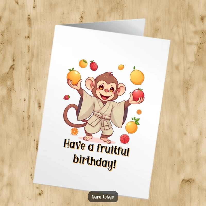Funny Free Printable Birthday Card: Graceful monkey in a silk kimono expertly juggling colorful fruit with a calm expression.