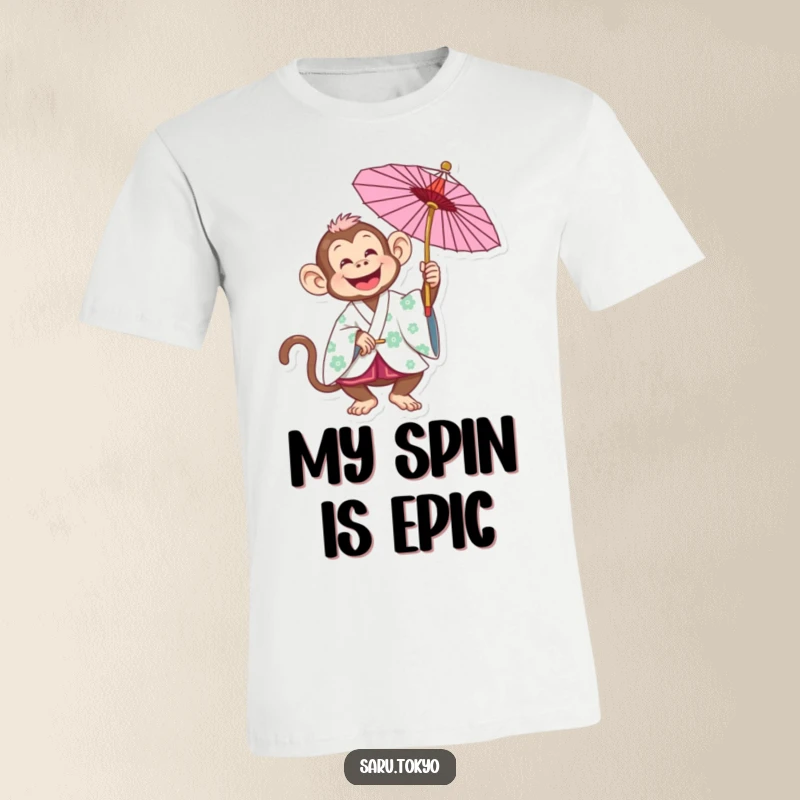 Funny Monkey T-Shirt: A happy monkey in a festive kimono joyfully spins a parasol, showcasing pure delight.